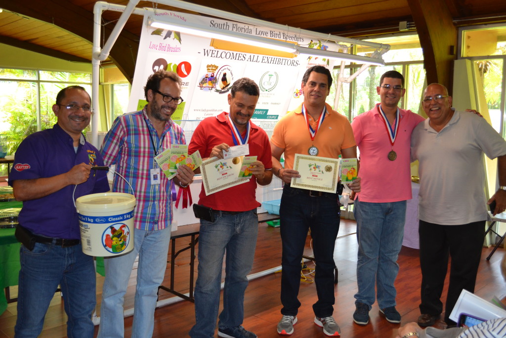 Left to right: Simbad's Pet Shop Fernando Dona presented a Quiko award. Mr. Jose De Cote presenting the Best in Show award to Armando Rodriguez, 2nd place Oscar Bouza, 3rd place Fabio Tarazona and 4th place Luis Gonzalez.